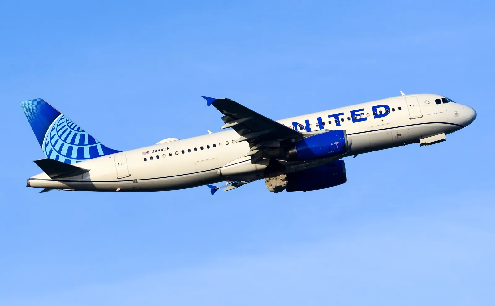 United Airlines jet engine sparks fire on wing during takeoff at Houston airport