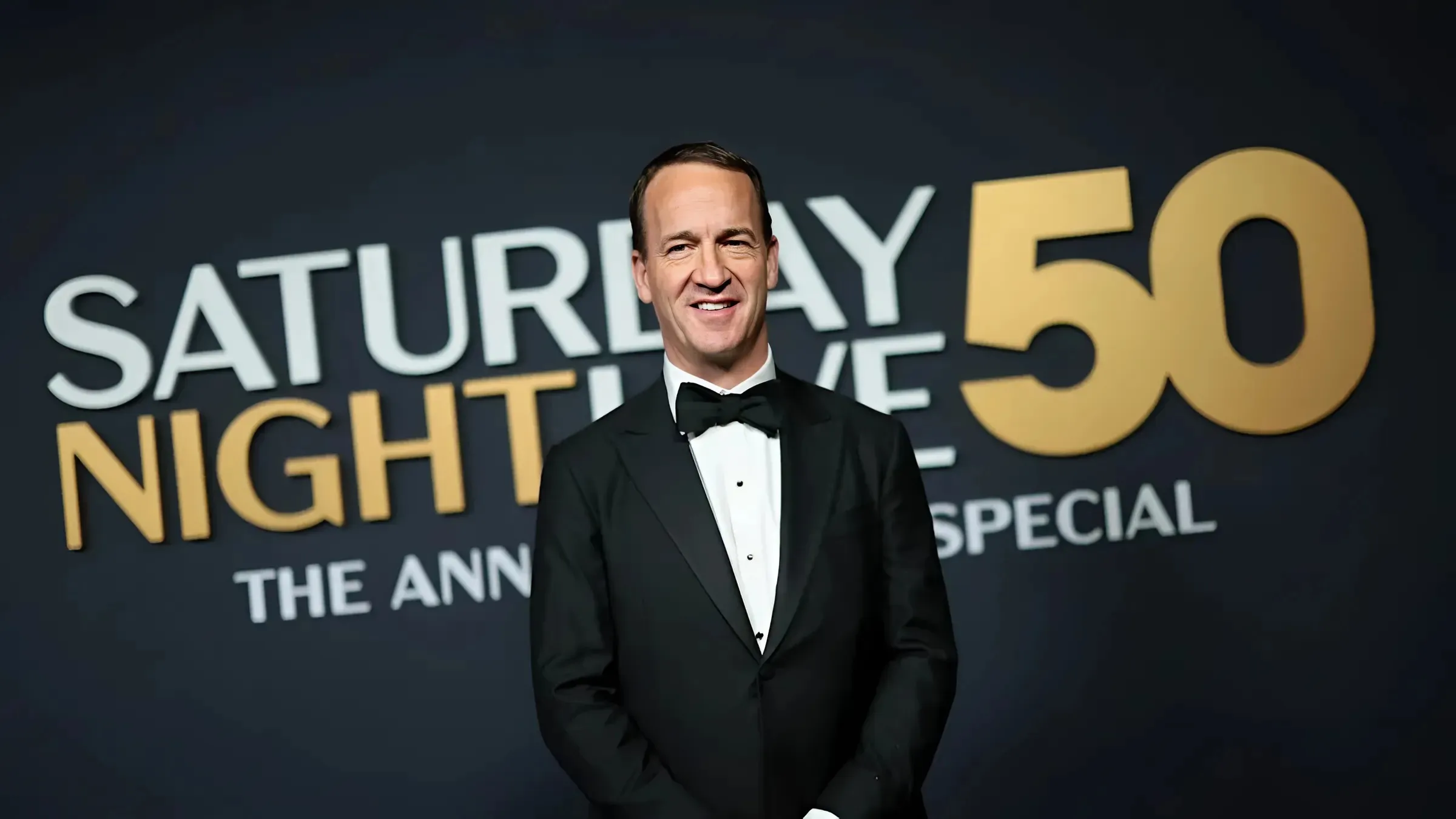 Peyton Manning pokes fun at 'brutal' retirement during SNL 50th anniversary