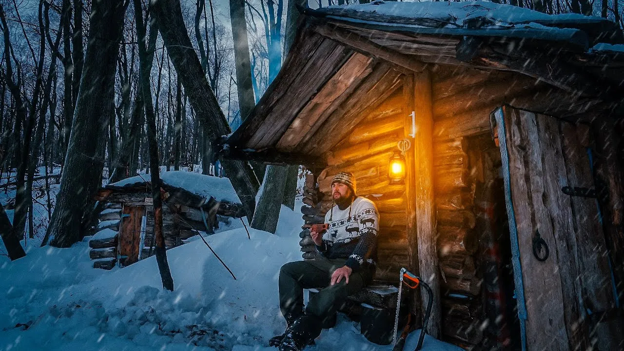 My snowmobile broke down but a log cabin in the forest saved me from the snowstorm