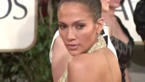 P3.  Jennifer Lopez Stuns at the 2024 Met Gala in an 800-Hour Schiaparelli Gown, But Fans Are Concerned About Her Mood