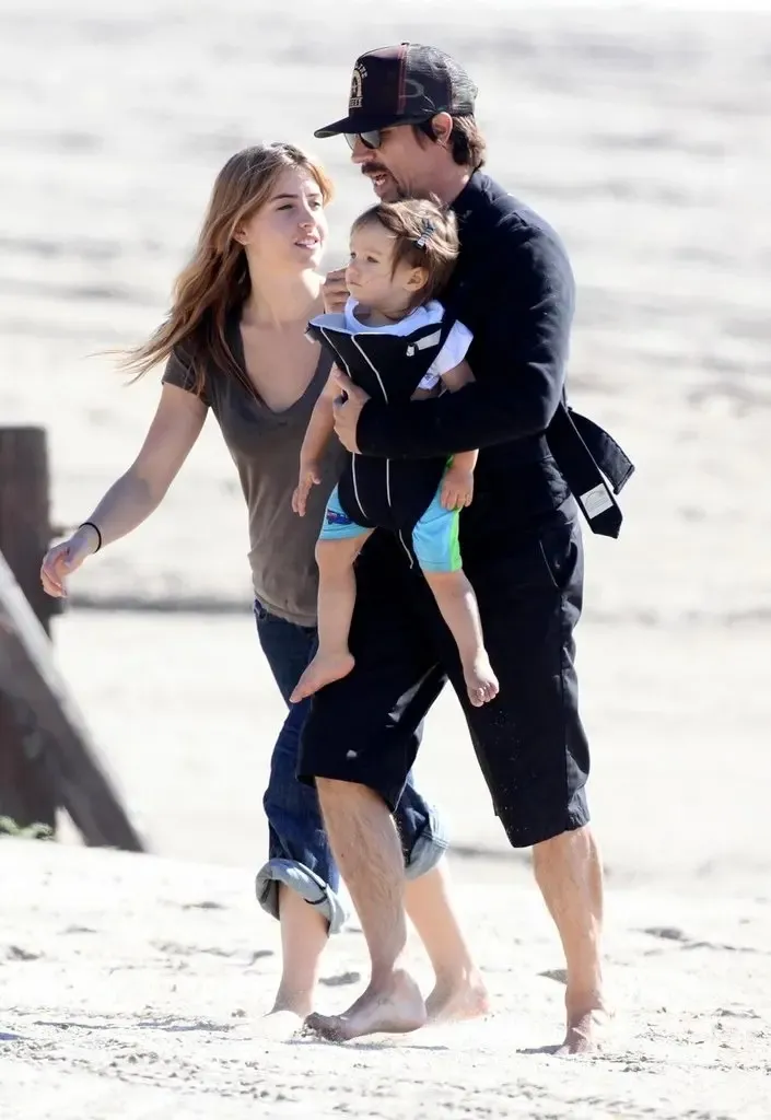 Anthony Kiedis enjoys a vacation with his family on the beach in Malibu after saying he only dated a 20 year old girl