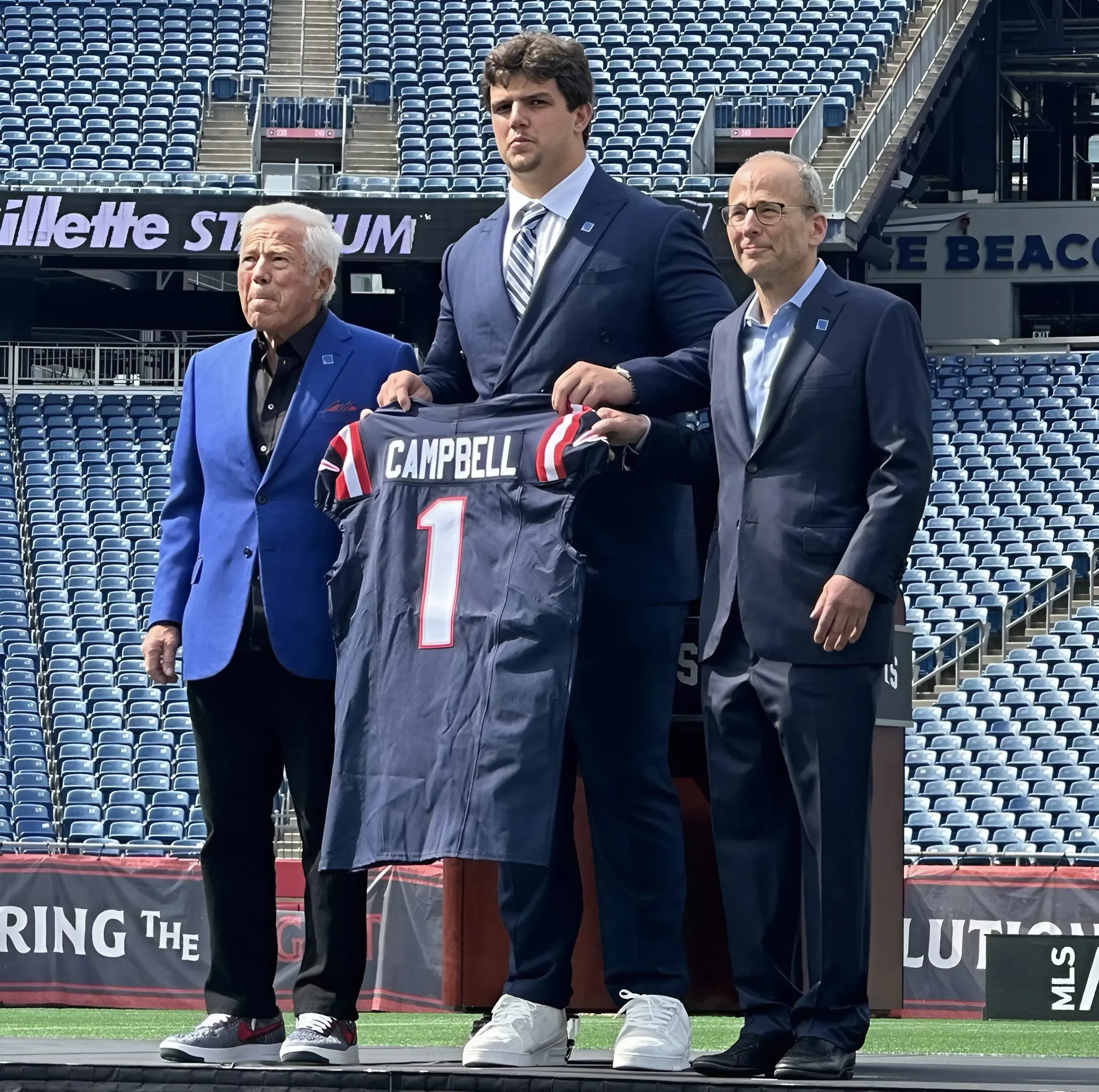 Scenes from Patriots first-round pick Will Campbell's introduction as photos show why he's already fitting right in