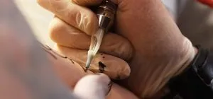 F. The ‘three-dot tattoo’ – potential meaning and significance