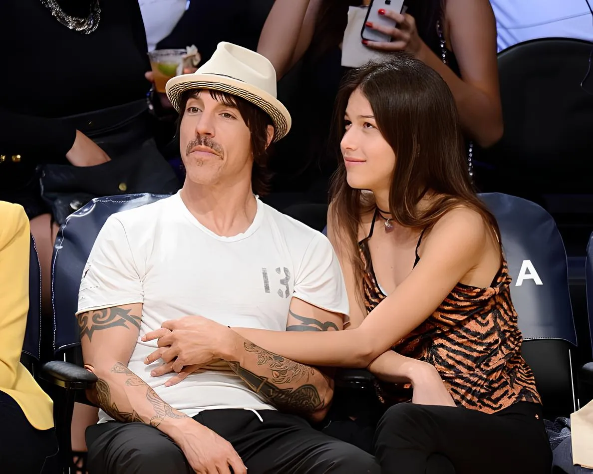 Red Hot Chili Peppers' Anthony Kiedis, 61, caught engaged in public display of affection while watching NBA with his girlfriend Helena, 19