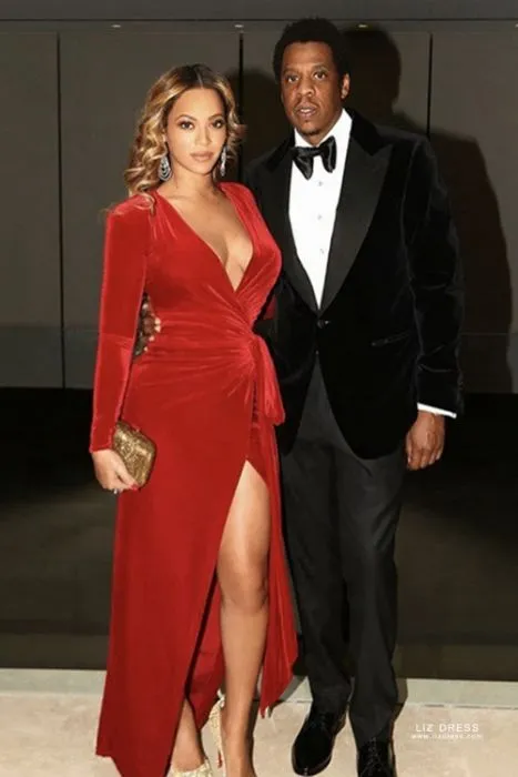 Beyonce left fans spellbound as she looked stunning in an expensive red dress, walking alongside Jay Z at the pre-Grammy party in Beverly Hills, California💃