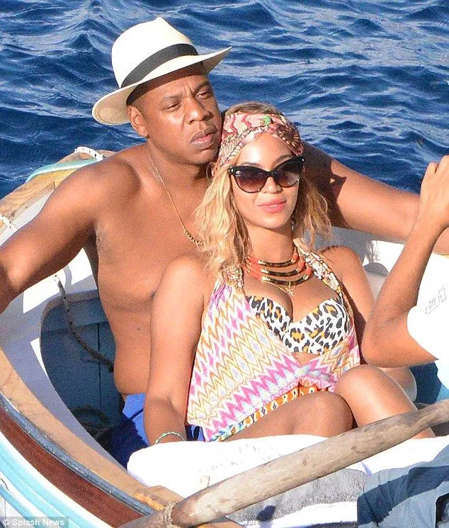 Beyonce and Jay-Z trade their luxury yacht for a humble rowing boat as they set off for Capri