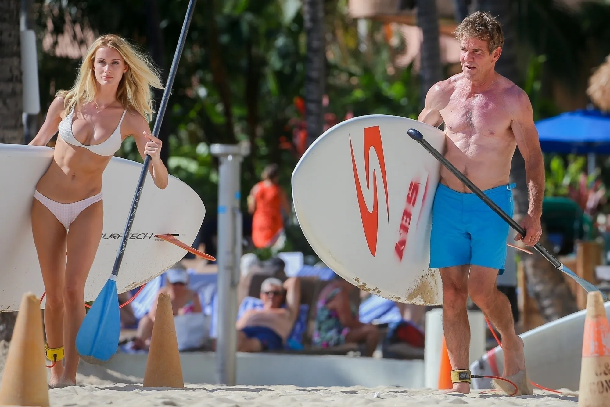 Dennis Quaid, 70, enjoys vacation with wife Laura Savoie, 30, on Hawaii beach 'I've been married 4 times and I'm sure this time is right' - She's the same age as his son