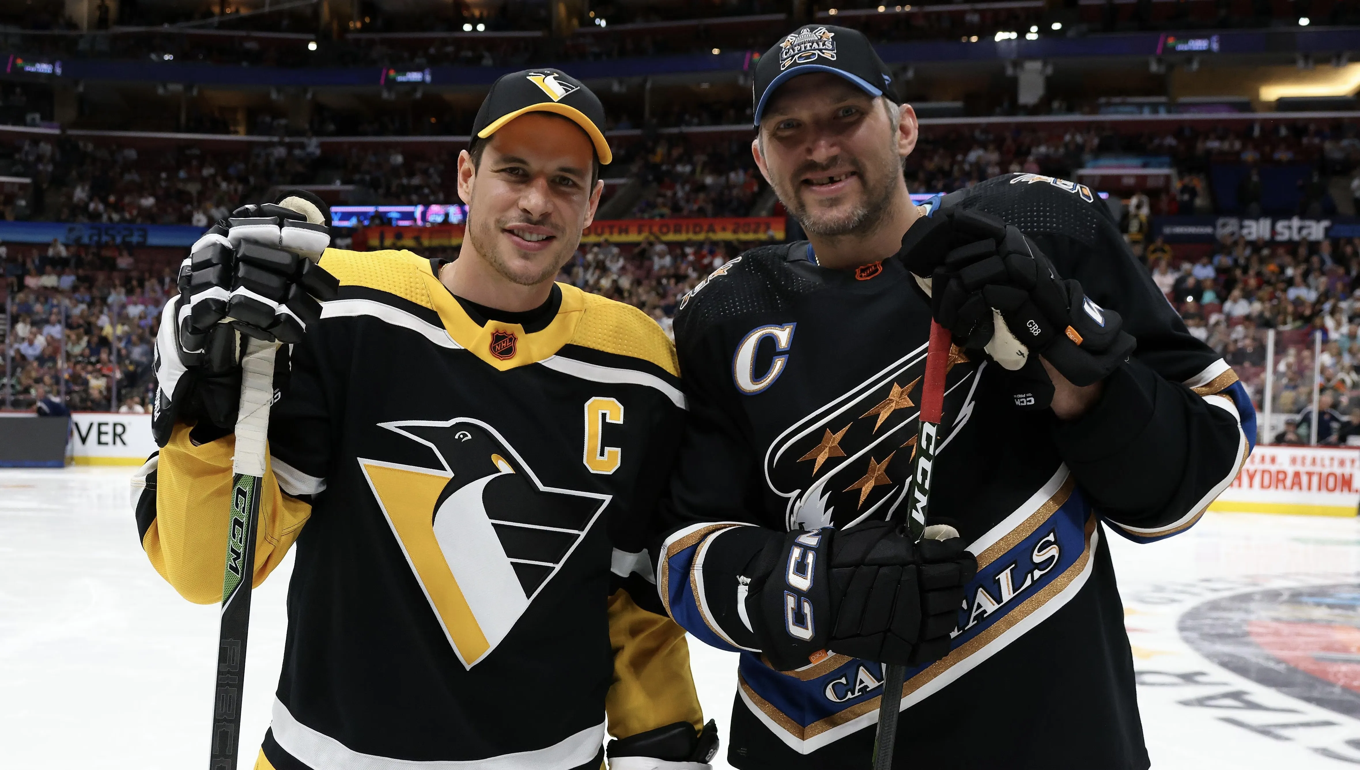 Alex Ovechkin shows off the Rolex watch he was gifted by Sidney Crosby and Evgeni Malkin in honor of breaking NHL goals record