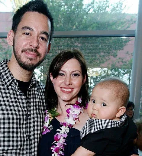 Shinoda and his wife, Anna, hold hands on Wednesday as they leave Beverly Glen Market in Los Angeles.
