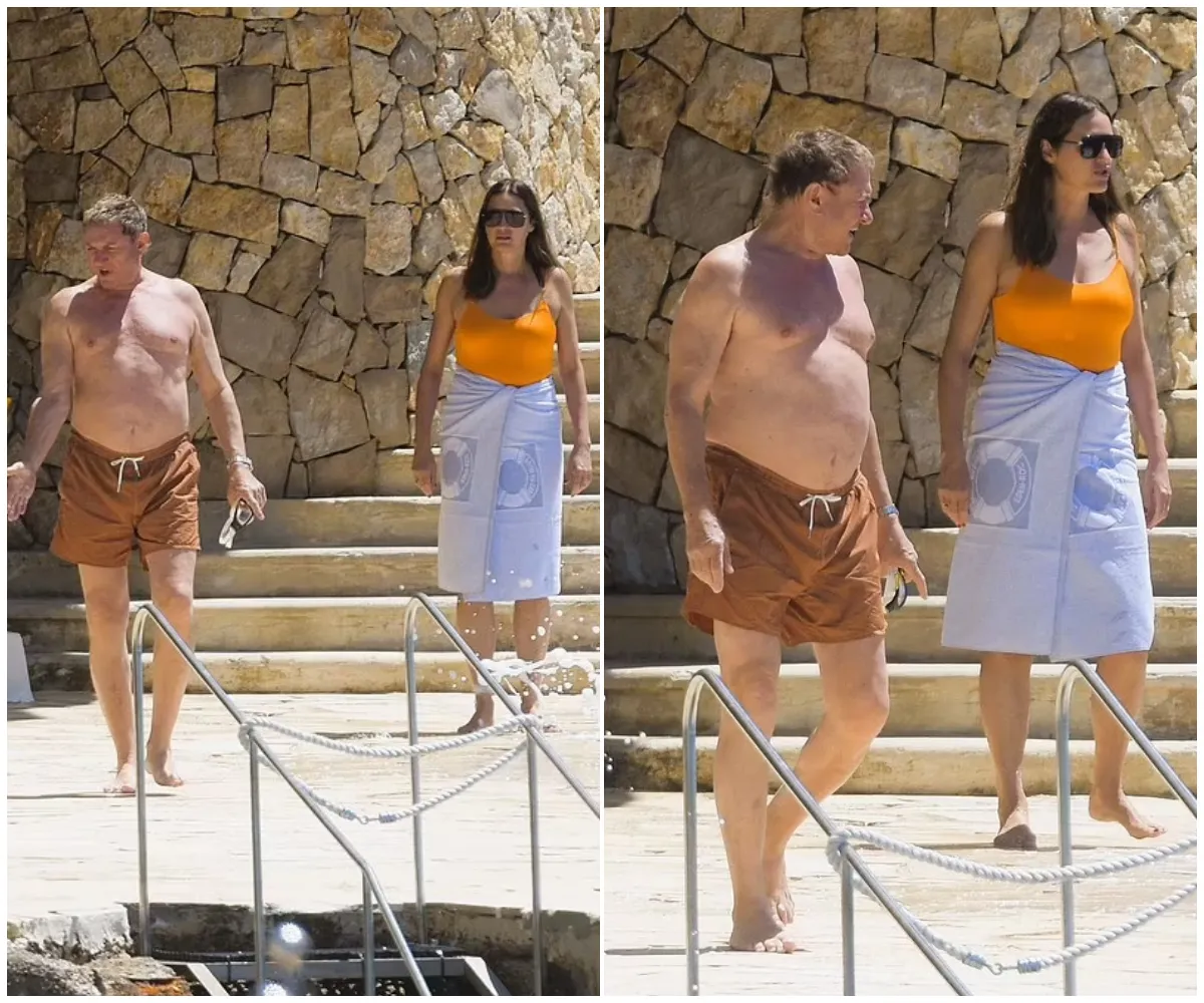 Still making waves! Duran Duran frontman Simon Le Bon, 66, shows off his beach-ready frame as he takes a refreshing dip with stunning wife Yasmin, 60, in a luxury French Riviera getaway - suong