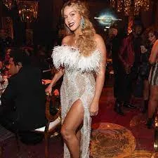 Beyonce flaunts her figure in a glittering silver dress as she joins husband Jay-Z for SECOND night of his Shawn Carter Foundation gala