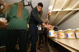 Giannis Antetokounmpo Donates Food, Serves Residents at Milwaukee Community Center