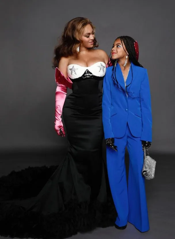 Suits you! Beyonce proudly shares snap of Blue Ivy wearing sharp outfit in her favorite color at gala where ten-year-old surprised crowd with $85k bid for jewelry