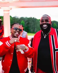 Rick Ross pulled off a highly successful annual car show, featuring over 500 rare supercars, and extended an invitation to 2Chainz to join the event