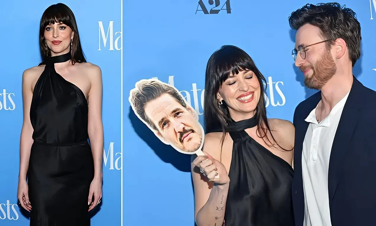 Dakota Johnson 'kisses' hunky co-star at film premiere after ex Chris Martin's shock shout-out amid split
