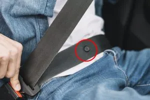 P4.  Do You Know What That Little Button on Your Seat Belt Is For?