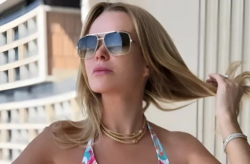 Amanda Holden, 54, flaunts her incredible figure in a chic patterned bikini and matching sarong as she soaks up the sun in Dubai