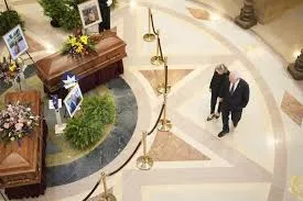 Biden joins thousands paying final respects to slain Minnesota lawmaker and husband