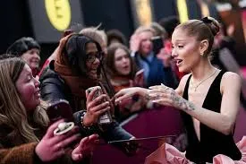 Ariana Grande signing fans pictures at the BAFTA’s