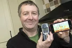 Britain's 'oldest mobile phone in use' has survived war zones and the washing machine