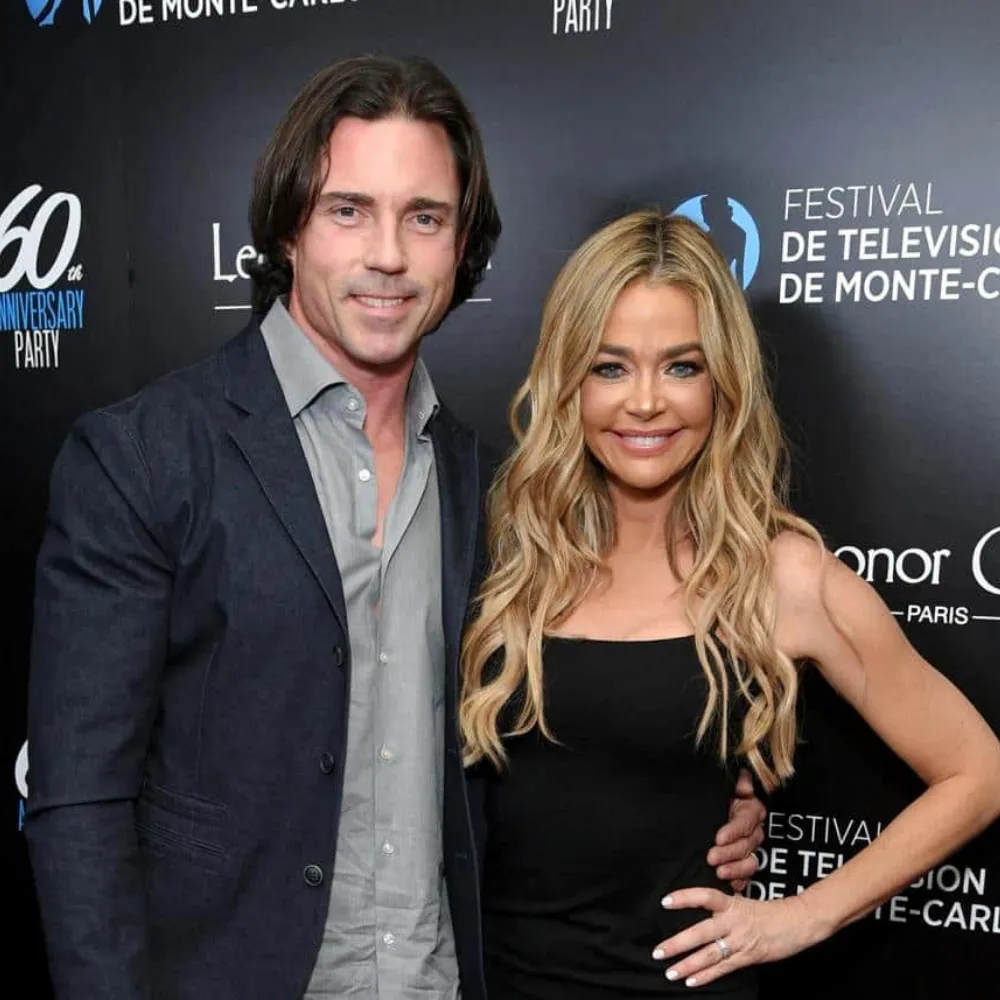 Denise Richards and Aaron Phypers’ marriage branded ‘toxic’ as insider reveals brutal blow-out fight that pushed him to file for divorce and claims Denise is left ‘devastated and relieved’ while Aaron flaunts his freedom without a wedding ring