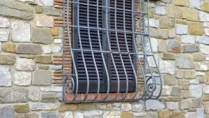 P4.  If you see window grills with a curve at the bottom here's what it means