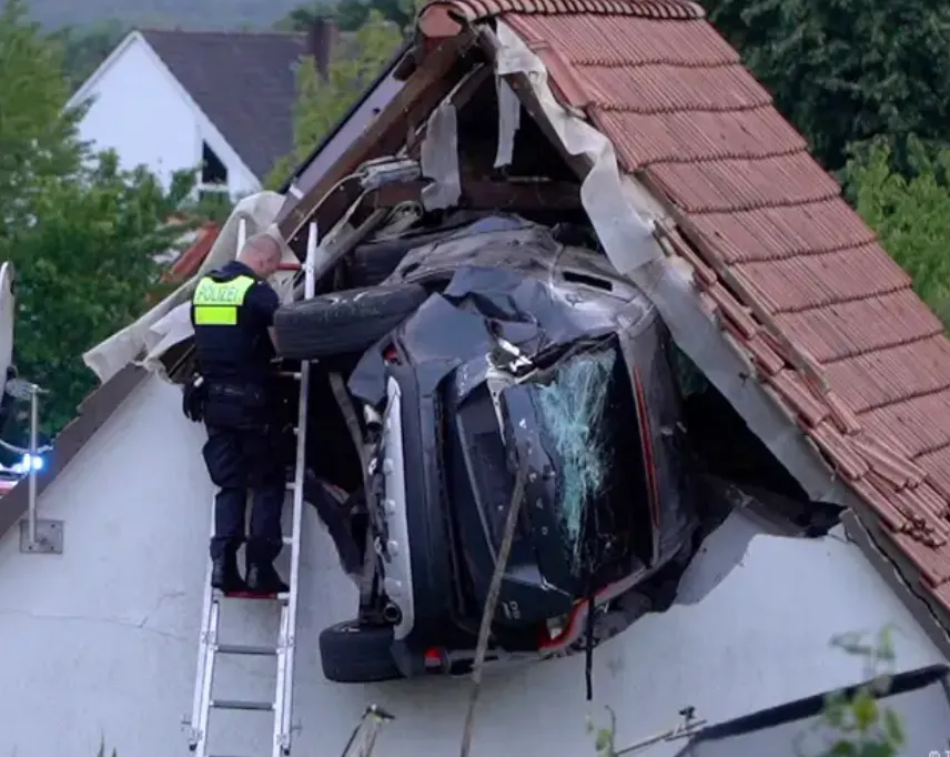 A car veered off a road, hit a seven-year-old boy on a trampoline and went flying into a barn roof on its side