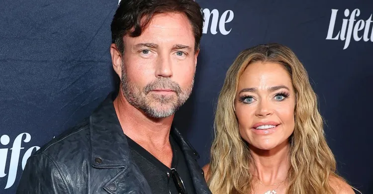 Denise Richards says Aaron Phypers's father joined in on alleged abuse by calling her a 'w***e' in shock tirade