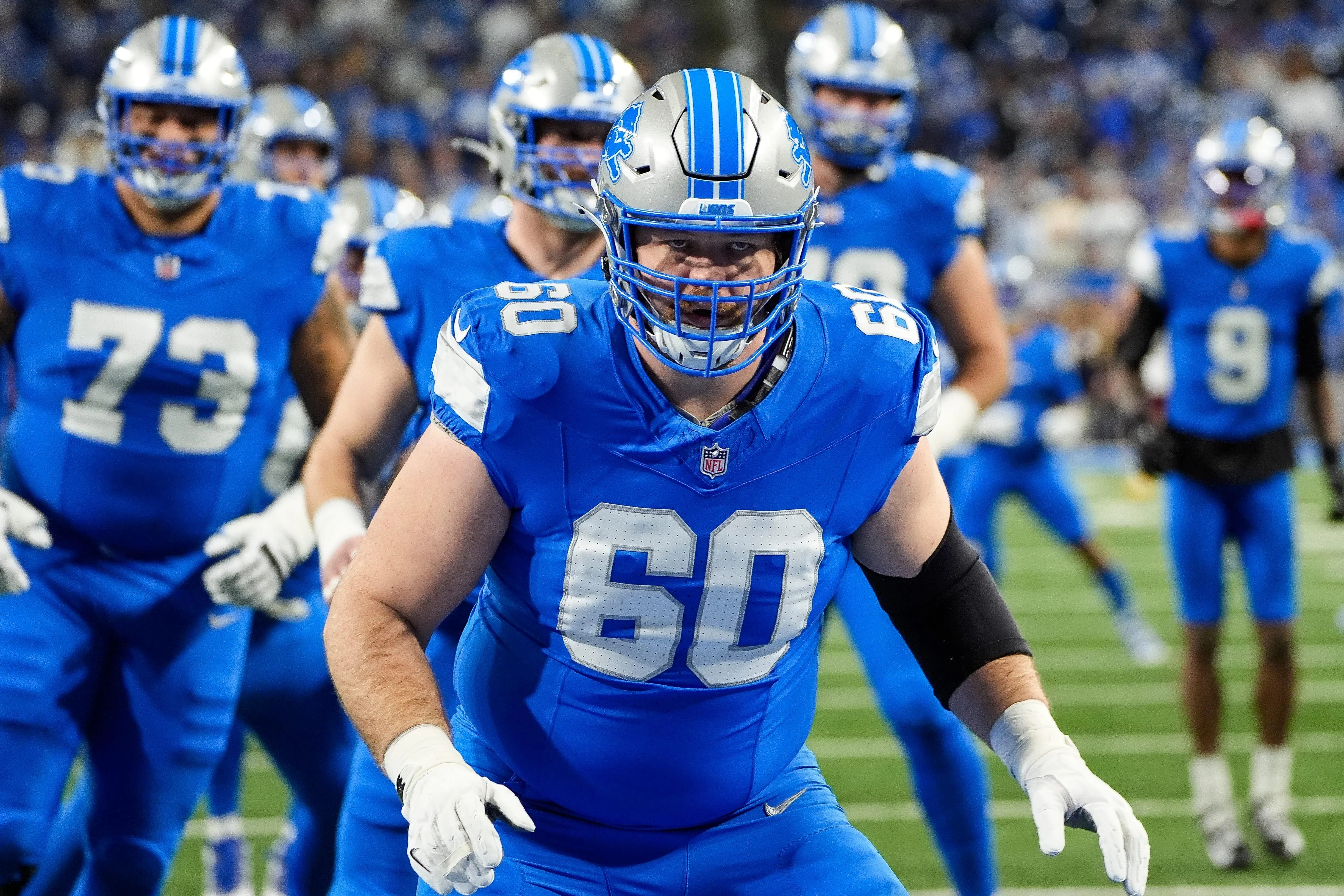 Graham Glasgow is glad to be back in his rightful spot on Lions' offensive line