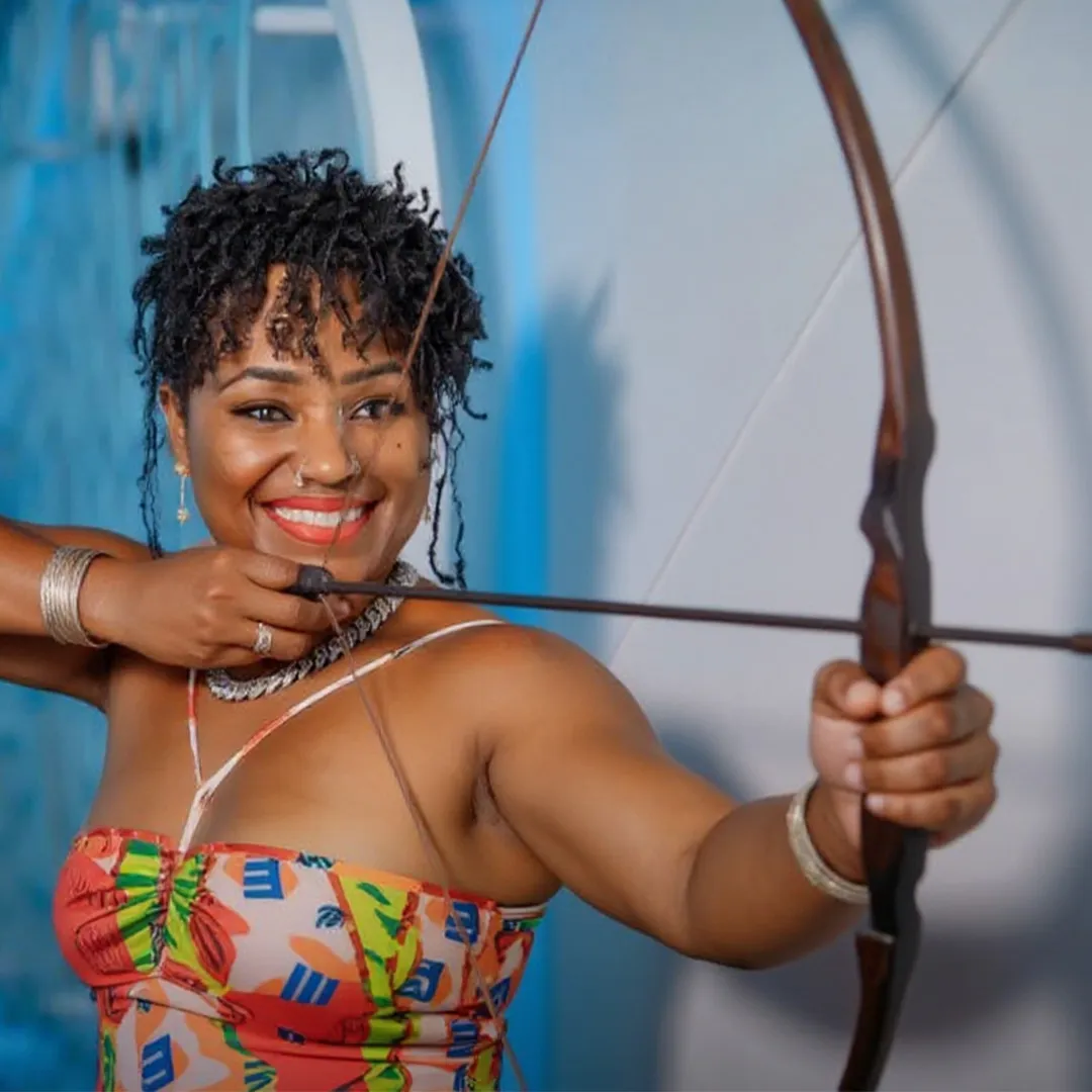 Blove is learning archery to protect her family in case survival becomes a reality.