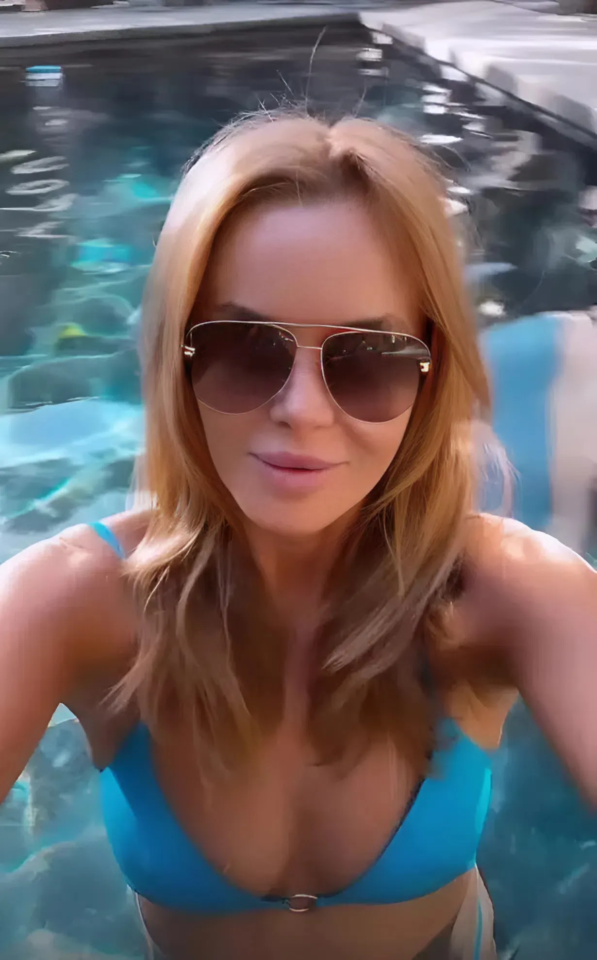 Amanda Holden In Bikini Is “Soaking It All Up” On Vacation