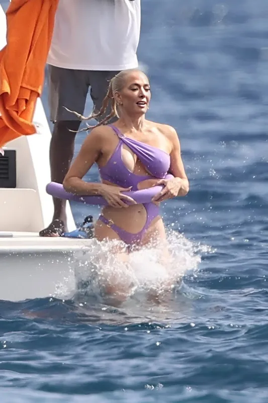 Erika Jayne: She may be a 'lying villain', but she shines brightly in dreamy purple - lulu