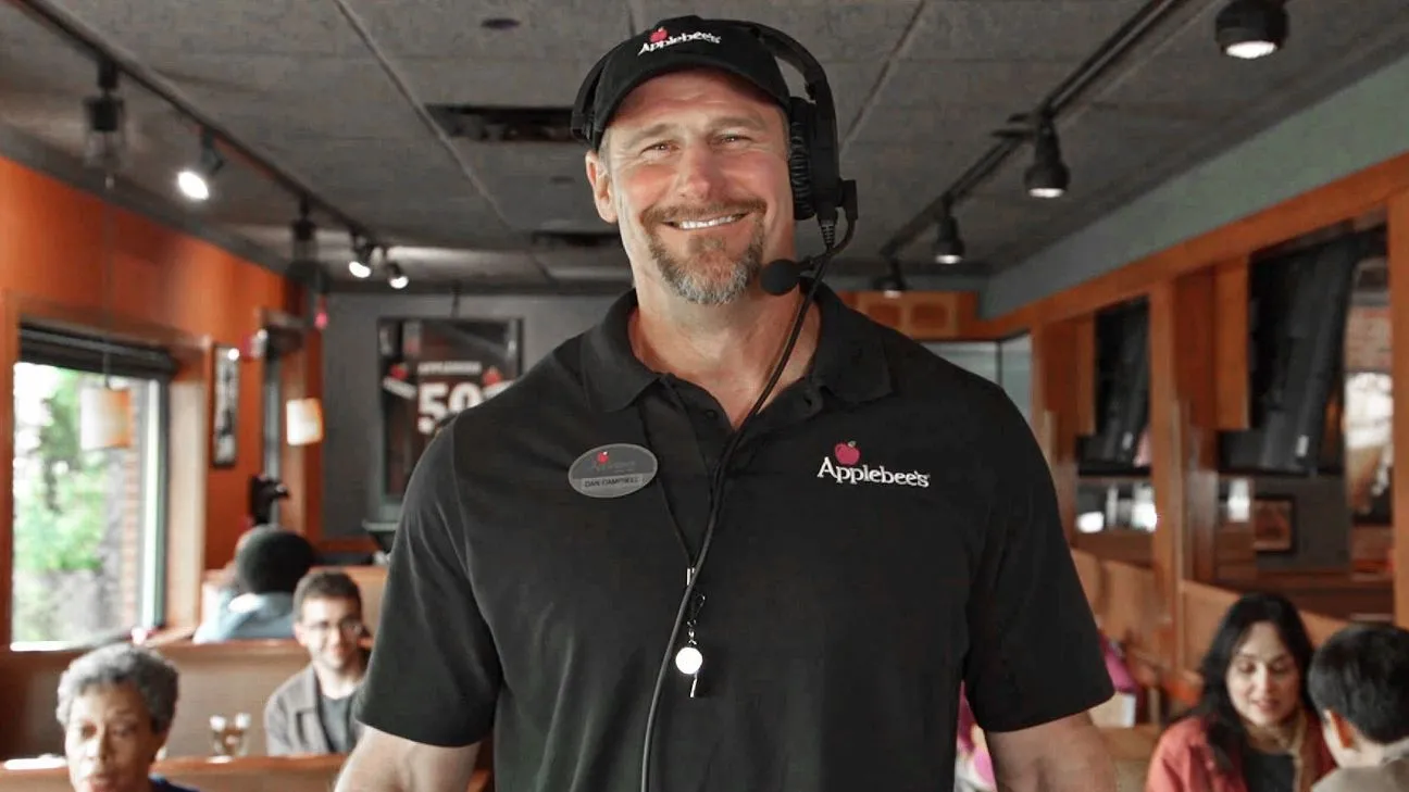 Coach by Day, Star by Night: Dan Campbell Returns to Applebee’s Spotlight