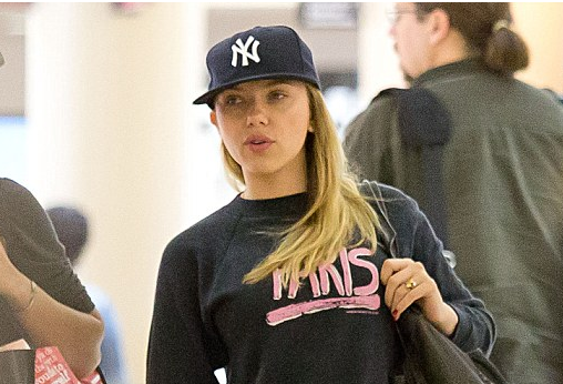 Scarlett Johansson shows she's a transatlantic girl at heart as she goes make-up free in logo sweater