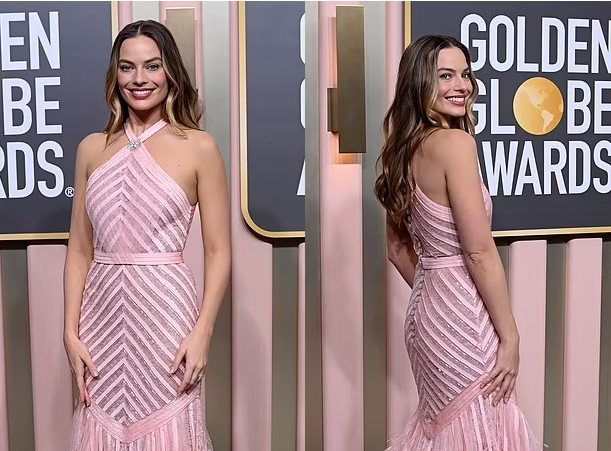 Margot Robbie is pretty in a pink sheer sequinned Chanel dress as she dazzles on the red carpet at the Golden Globes