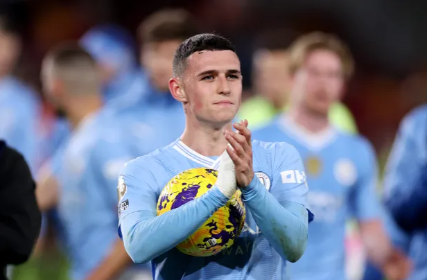 Stunning Foden hat-trick sees champions come from behind to leave them just two points off top