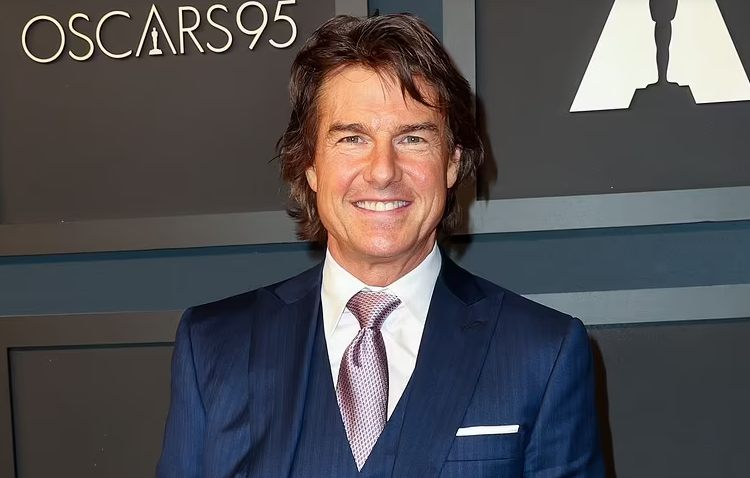 Tom Cruise shows off new tanned look with longer hair as he arrives at star-studded Academy Awards luncheon in LA alongside Jamie Lee Curtis and Michelle Williams