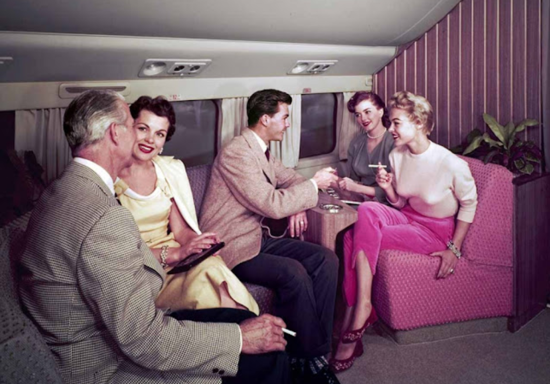 Before Laptops, iPads and Seat Back Videos: 13 Vintage Color Photos Show What Travelers Did to Pass the Time on Long Flights in the 1950s and '60s